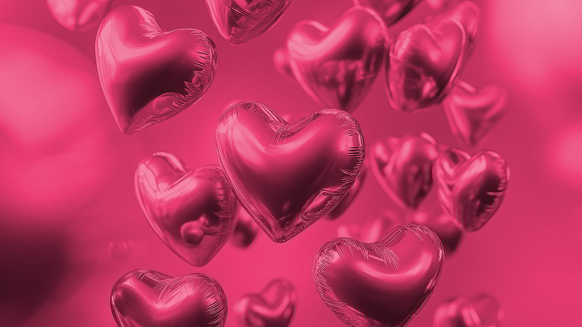Rosa hjärtballonger.