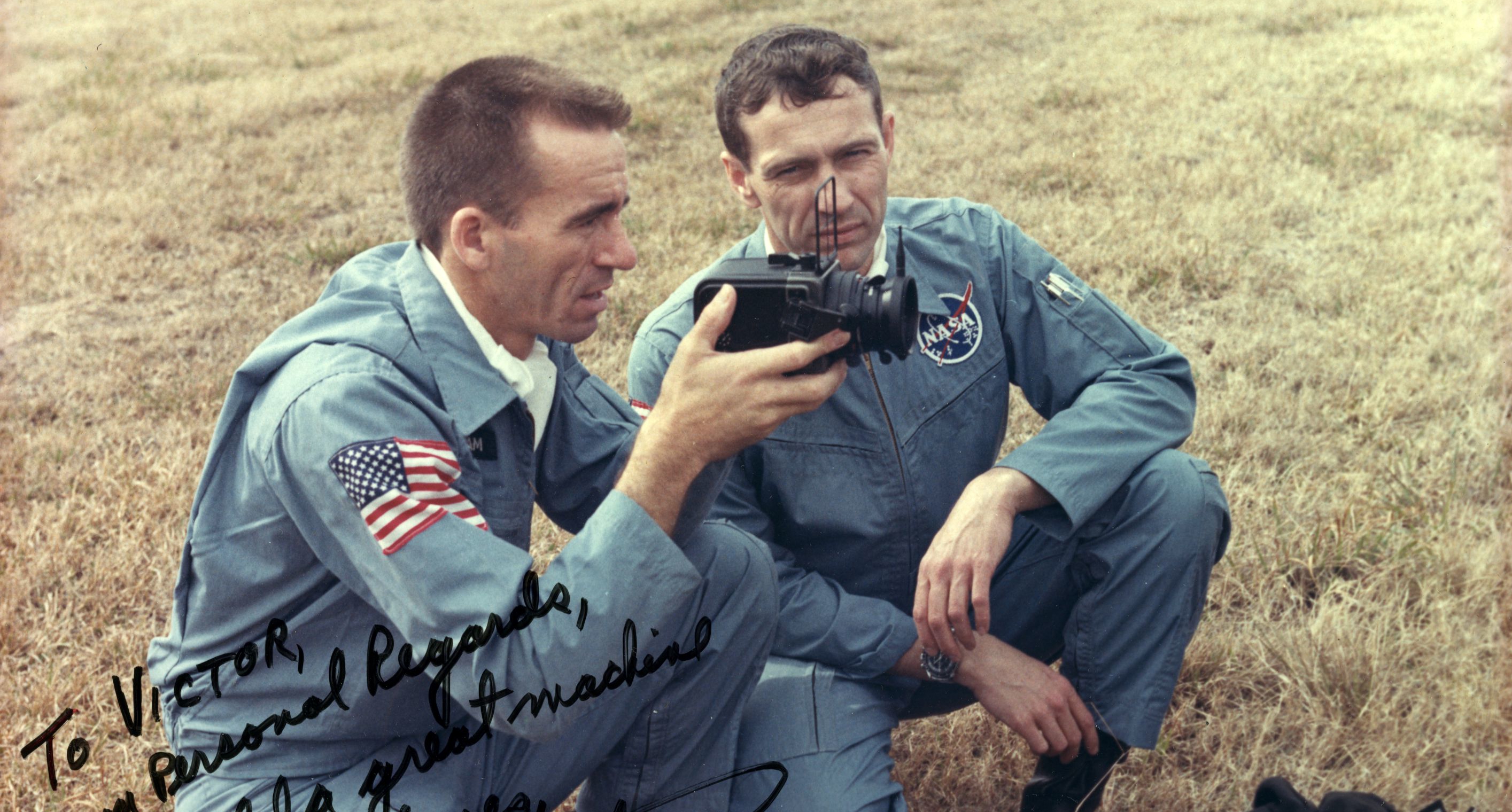 Photograph of astronauts Walter Cunningham and Donn F. Eisele with a personal greeting to Victor Hasselblad.